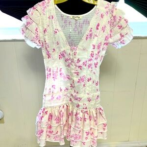 Yvonne & Love gorgeous dress with lace inserts and pearl buttons.